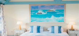 Image de la chambre d'hôtel montrant un lit